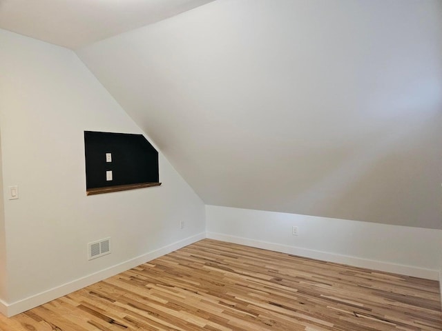 46 Lowell Ave NE, Grand Rapids, MI 49503 - bonus room featuring light wood-style floors and vaulted ceiling
