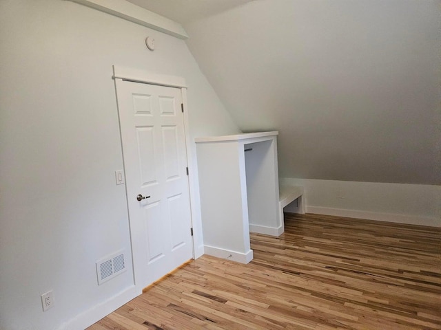 46 Lowell Ave NE, Grand Rapids, MI 49503 - additional living space with lofted ceiling and light wood-type flooring