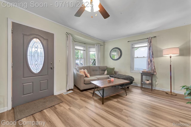 36149 Schley Ave, Van Buren, MI 48186 - living room with plenty of natural light, light wood finished floors, ceiling fan, and ornamental molding