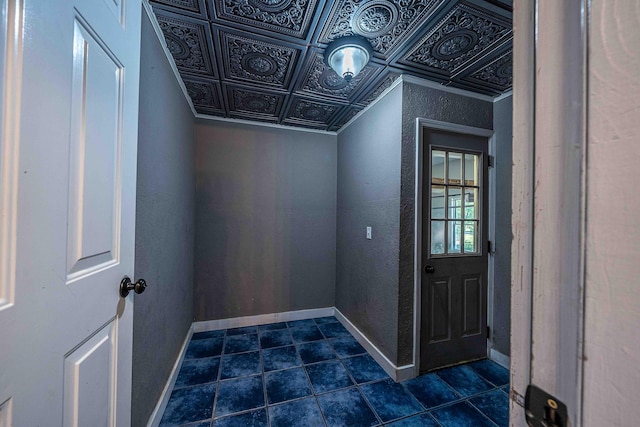 4433 Elm St, New Era, MI 49446 - entryway featuring an ornate ceiling and dark tile patterned flooring