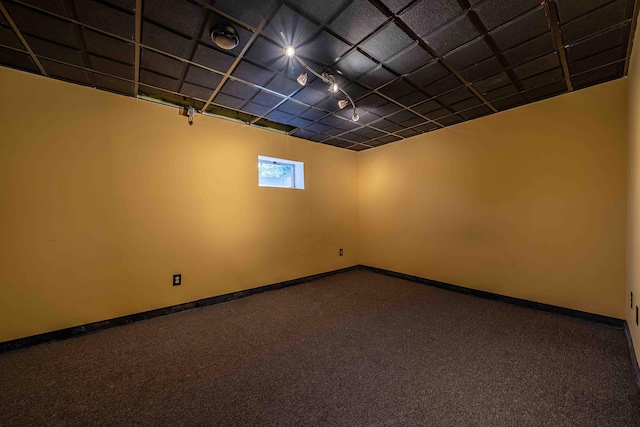 4433 Elm St, New Era, MI 49446 - spare room featuring carpet floors and baseboards