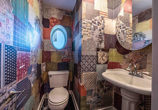 4433 Elm St, New Era, MI 49446 - bathroom featuring toilet