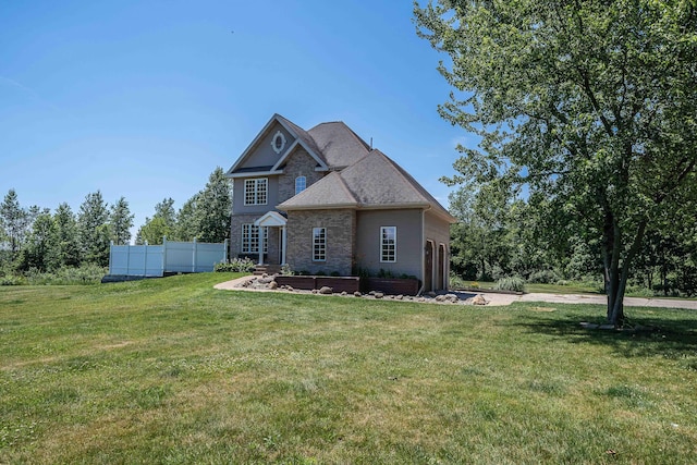 4433 Elm St, New Era, MI 49446 - view of front of property with stone siding