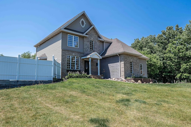 4433 Elm St, New Era, MI 49446 - view of front facade featuring brick siding