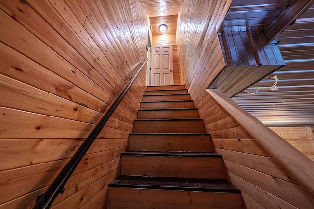 4433 Elm St, New Era, MI 49446 - stairway with wood walls and wood ceiling