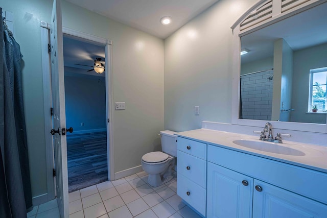 4433 Elm St, New Era, MI 49446 - full bath featuring vanity, tile patterned floors, a ceiling fan, and a shower