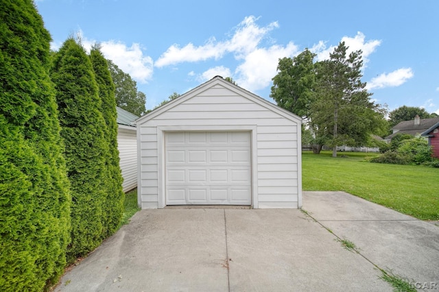 309 E Logan St, Tecumseh, MI 49286 - detached garage featuring driveway