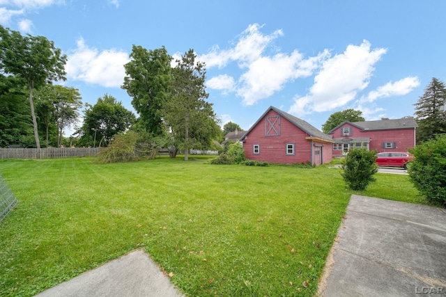 309 E Logan St, Tecumseh, MI 49286 - view of yard featuring a barn