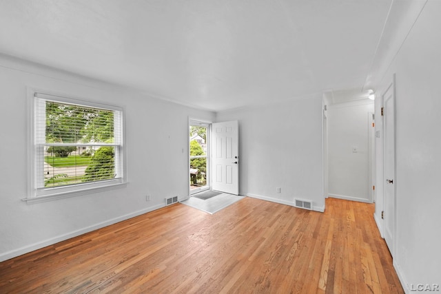 309 E Logan St, Tecumseh, MI 49286 - spare room featuring light wood finished floors and baseboards