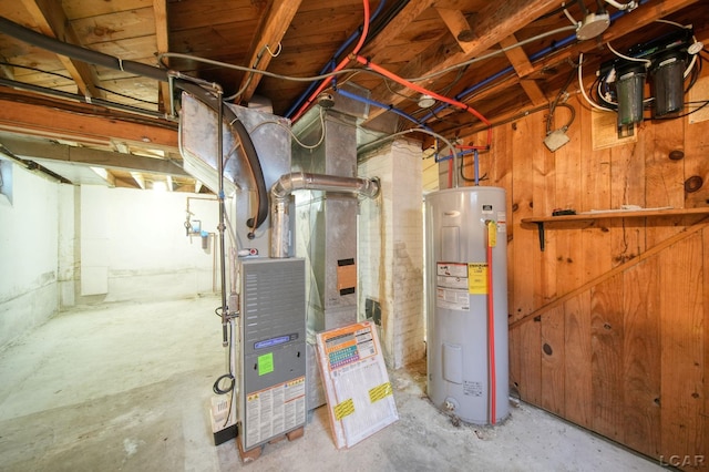 309 E Logan St, Tecumseh, MI 49286 - utility room featuring water heater and heating unit