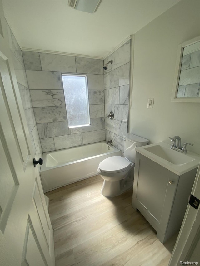 3512 Barry St, Wayne, MI 48184 - full bathroom with vanity, shower / bathtub combination, and wood finished floors