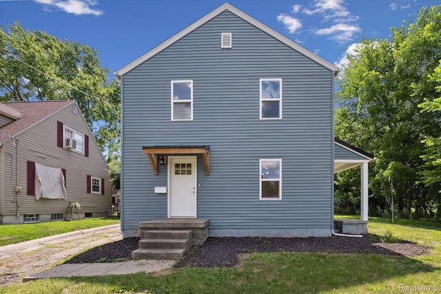 1516 Gainey Ave, Flint, MI 48503 - traditional-style home with a front lawn