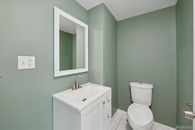 1516 Gainey Ave, Flint, MI 48503 - half bathroom featuring vanity and baseboards