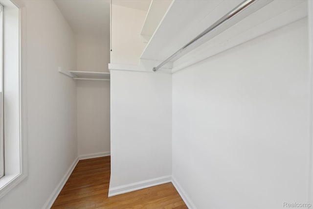 1516 Gainey Ave, Flint, MI 48503 - walk in closet featuring light wood finished floors