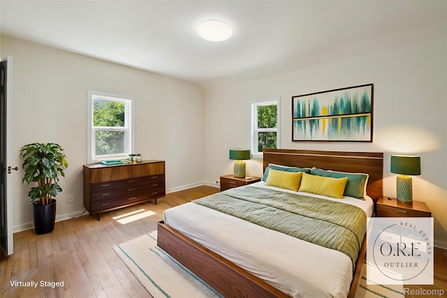 1516 Gainey Ave, Flint, MI 48503 - bedroom featuring hardwood / wood-style flooring and baseboards