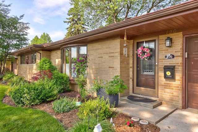 120 Sunburst Dr, Frankenmuth, MI 48734 - property entrance featuring brick siding