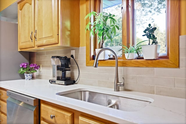 120 Sunburst Dr, Frankenmuth, MI 48734 - kitchen featuring dishwasher, backsplash, light brown cabinets, and light stone countertops
