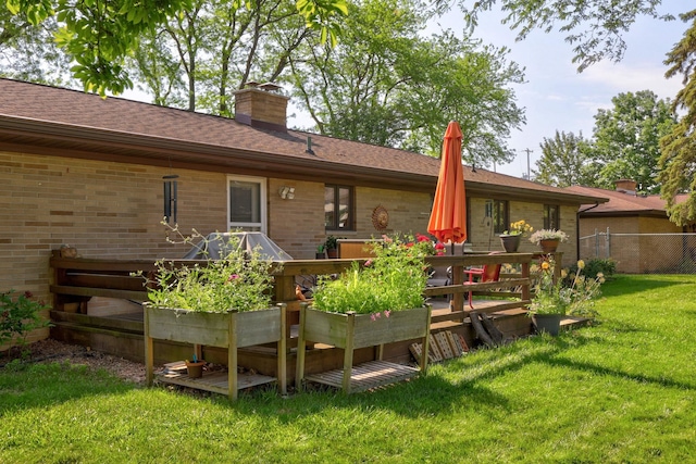 120 Sunburst Dr, Frankenmuth, MI 48734 - back of house featuring a chimney and brick siding