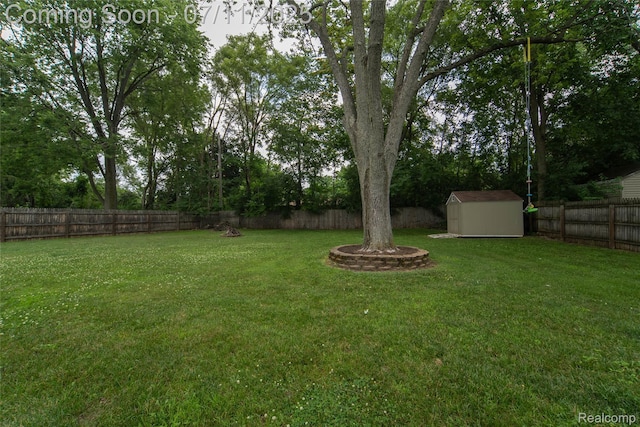 3238 Homestead Dr, Waterford, MI 48329 - fenced backyard with a storage shed and view of wooded area