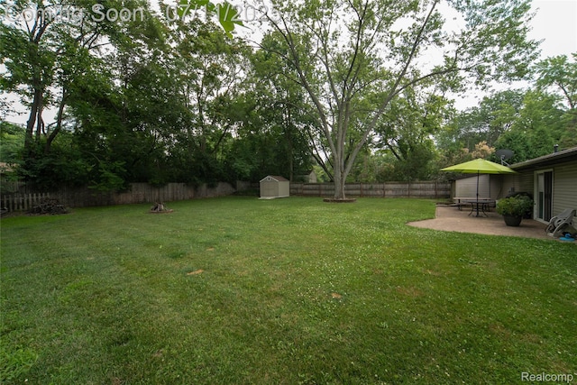 3238 Homestead Dr, Waterford, MI 48329 - fenced backyard featuring a shed, a patio area, and view of scattered trees