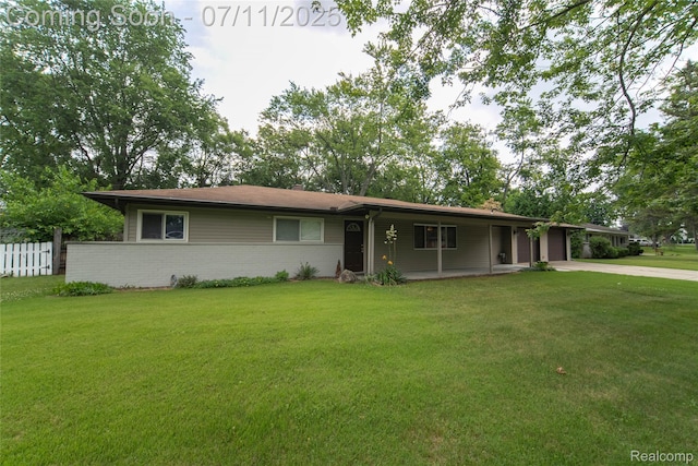 3238 Homestead Dr, Waterford, MI 48329 - single story home featuring driveway, an attached garage, a chimney, and brick siding