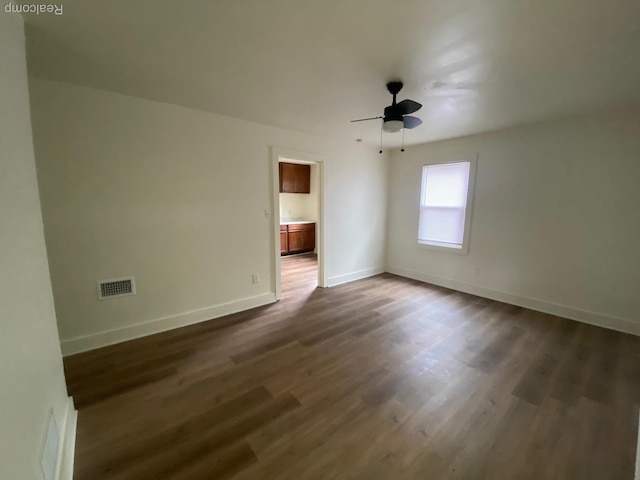 15354 Oldham St, Taylor, MI 48180 - spare room featuring dark wood-style floors and ceiling fan