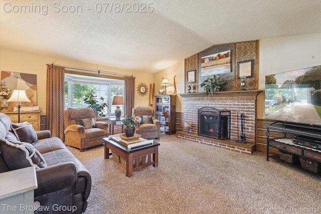 2210 Old Hickory Blvd, Davison, MI 48423 - living room featuring a brick fireplace, vaulted ceiling, carpet floors, and a textured ceiling