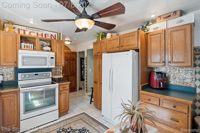 2210 Old Hickory Blvd, Davison, MI 48423 - kitchen featuring white appliances, tasteful backsplash, open shelves, light tile patterned flooring, and ceiling fan