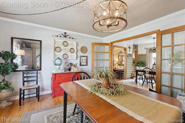 2210 Old Hickory Blvd, Davison, MI 48423 - dining space featuring a chandelier, wood finished floors, and crown molding