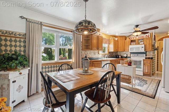 2210 Old Hickory Blvd, Davison, MI 48423 - dining area featuring a ceiling fan and light tile patterned floors