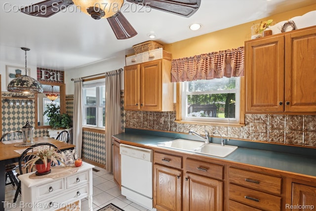 2210 Old Hickory Blvd, Davison, MI 48423 - kitchen with dishwasher, plenty of natural light, backsplash, and light tile patterned floors