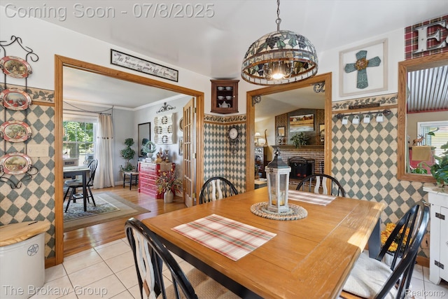 2210 Old Hickory Blvd, Davison, MI 48423 - dining area with a fireplace and light tile patterned flooring