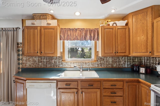 2210 Old Hickory Blvd, Davison, MI 48423 - kitchen with dishwasher, dark countertops, tasteful backsplash, and brown cabinets