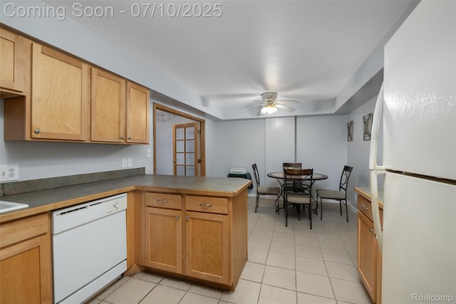 15801 Providence Dr # 5, Southfield, MI 48075 - kitchen with white appliances, a peninsula, light tile patterned floors, and ceiling fan
