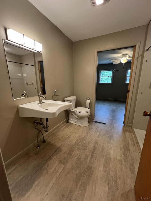 2244 Shannon Dr, Adrian, MI 49221 - bathroom with toilet and wood finished floors
