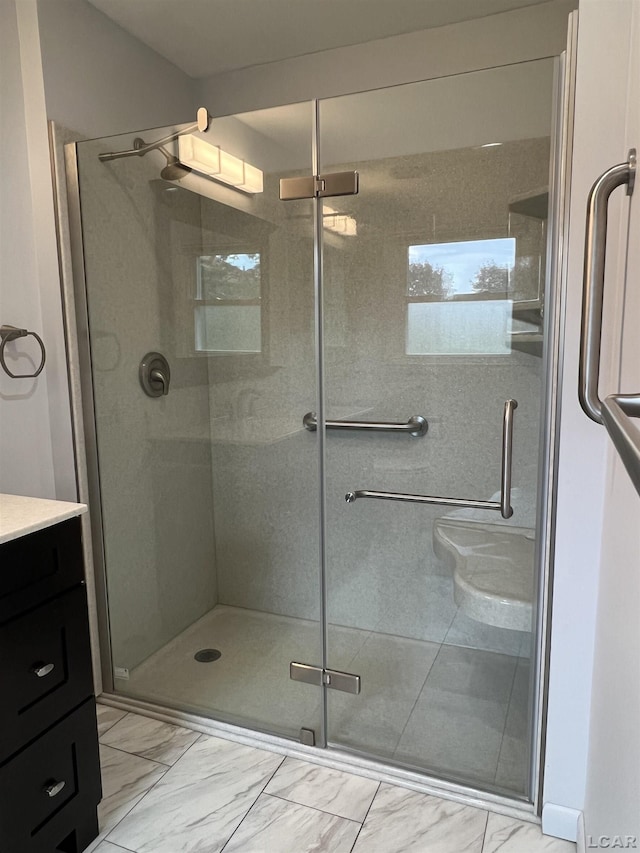 2244 Shannon Dr, Adrian, MI 49221 - full bathroom with marble finish floors, a shower stall, and vanity