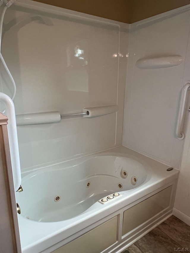 2244 Shannon Dr, Adrian, MI 49221 - bathroom featuring a combined bath / shower with jetted tub