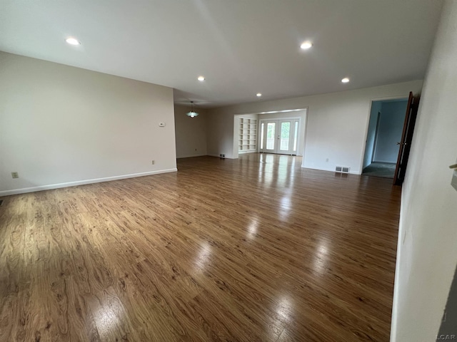 2244 Shannon Dr, Adrian, MI 49221 - empty room with wood finished floors and recessed lighting