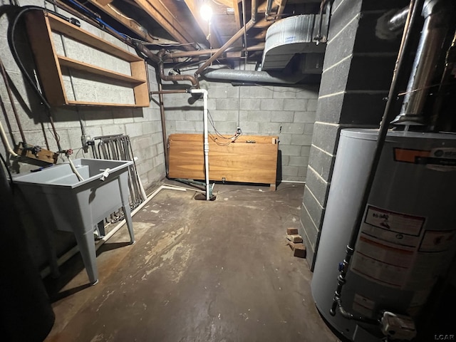 2244 Shannon Dr, Adrian, MI 49221 - unfinished below grade area with concrete block wall and water heater