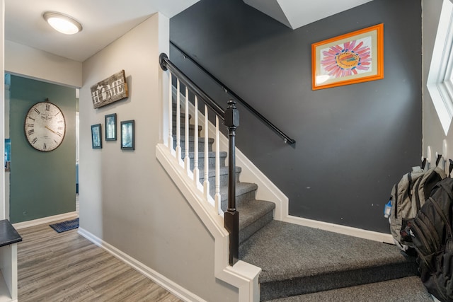 127 Ridgeview Ct, Grass Lake, MI 49240 - stairway with wood finished floors and baseboards
