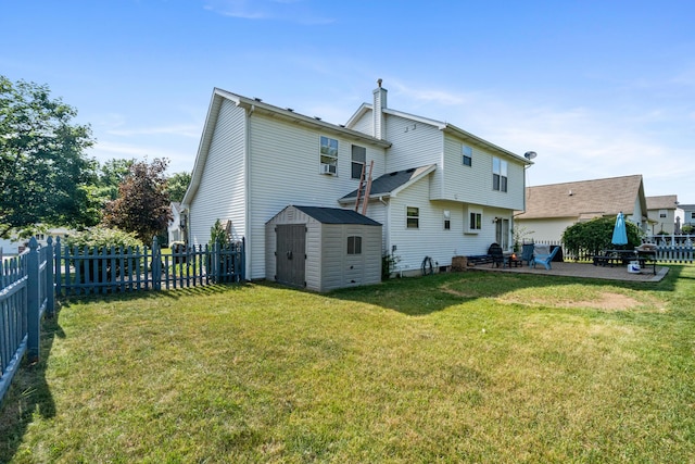 127 Ridgeview Ct, Grass Lake, MI 49240 - rear view of property featuring a patio, a storage shed, and a fenced backyard