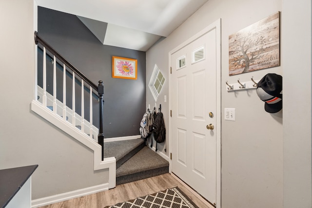 127 Ridgeview Ct, Grass Lake, MI 49240 - entrance foyer with light wood-style floors and stairway