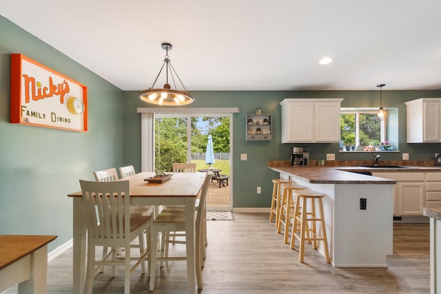 127 Ridgeview Ct, Grass Lake, MI 49240 - dining area featuring light wood-style flooring and recessed lighting