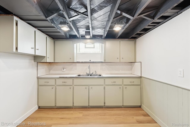 15101 Drake St, Southgate, MI 48195 - kitchen featuring light countertops, light wood-style flooring, cream cabinets, and a wainscoted wall