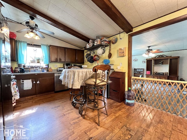 4949 S Iva Rd, Merrill, MI 48637 - kitchen with ceiling fan, dishwasher, wood finished floors, and dark brown cabinets