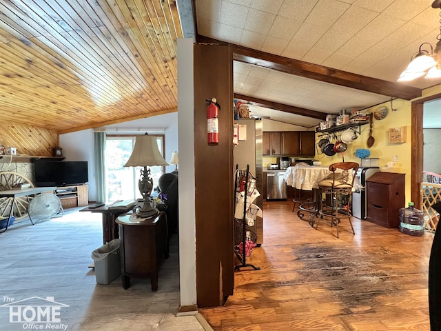 4949 S Iva Rd, Merrill, MI 48637 - living area with vaulted ceiling and wood finished floors