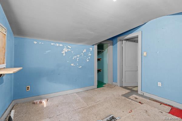 6431 Wagner, Detroit, MI 48210 - empty room with baseboards