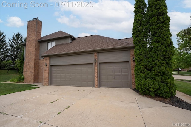 24145 Windridge Ln, Novi, MI 48374 - view of front of property featuring brick siding, a chimney, concrete driveway, a shingled roof, and a garage
