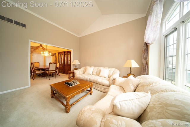 24145 Windridge Ln, Novi, MI 48374 - living area featuring a chandelier, carpet, and lofted ceiling