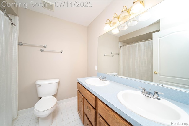 24145 Windridge Ln, Novi, MI 48374 - bathroom featuring double vanity and tile patterned floors